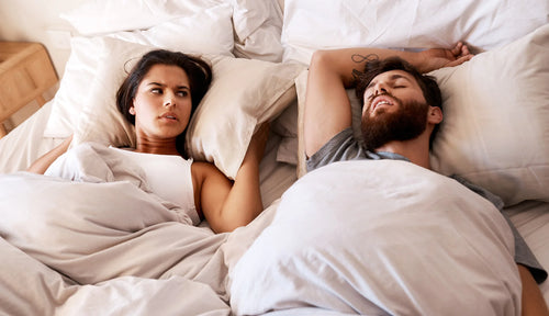 a man snoring and his wife can't sleep because of it
